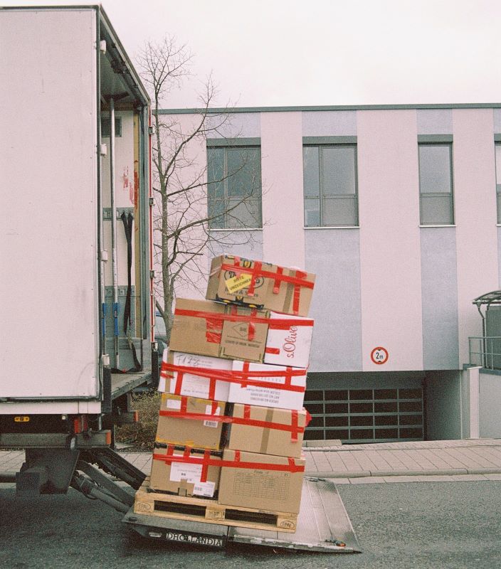 boxes being loaded into vehicle for house move